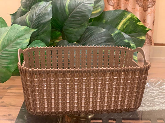 stack of multipurpose plastic storage baskets, designed with a wicker-like pattern.